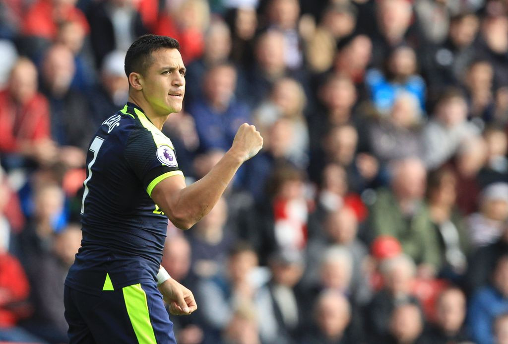Selebrasi Alexis Sanchez usai mencetak gol untuk Arsenal ke gawang Sunderland di Liga Primer Inggris (Foto: AFP PHOTO / Lindsey PARNABY)