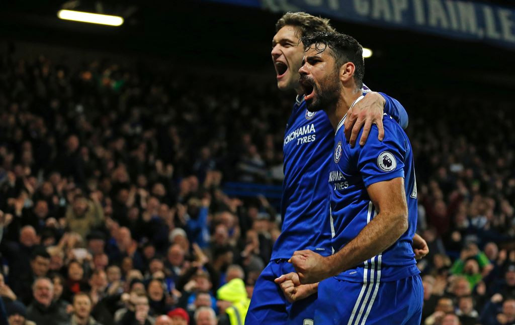 Diego Costa merayakan golnya ke gawang Stoke City (Kanan) (Foto: AFP/Ian Kington)