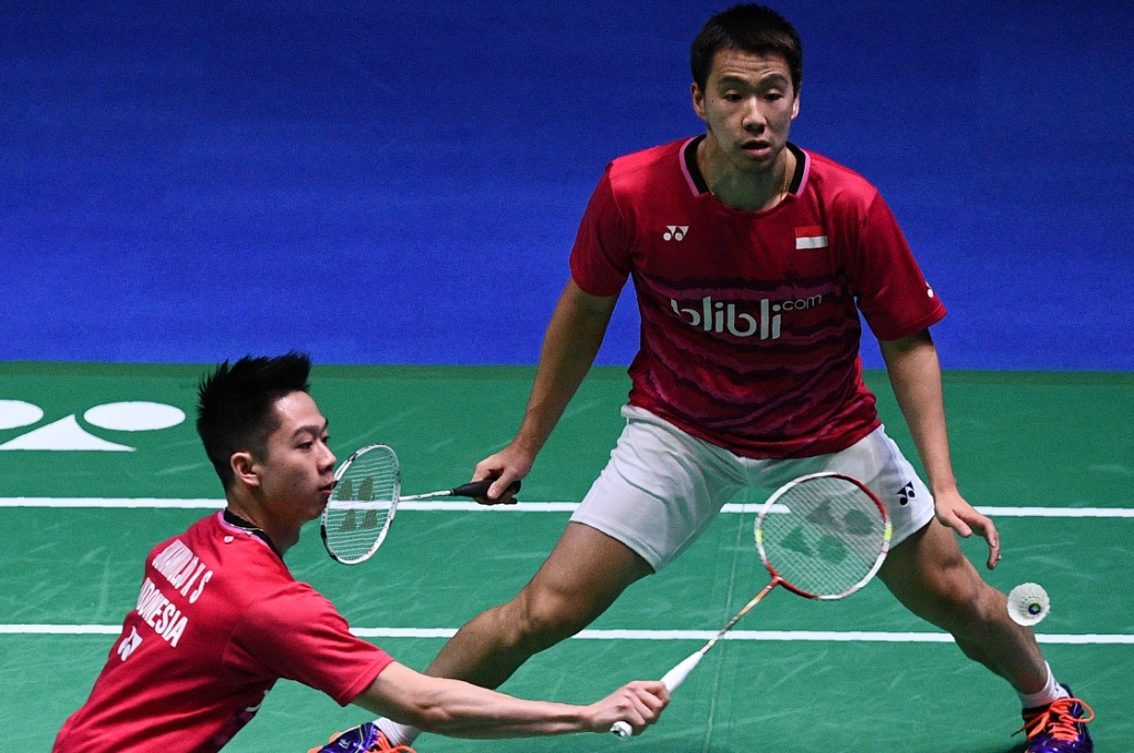 Marcus/Kevin tetap menjadi andalan Indonesia (Foto: Justin TALLIS / AFP)