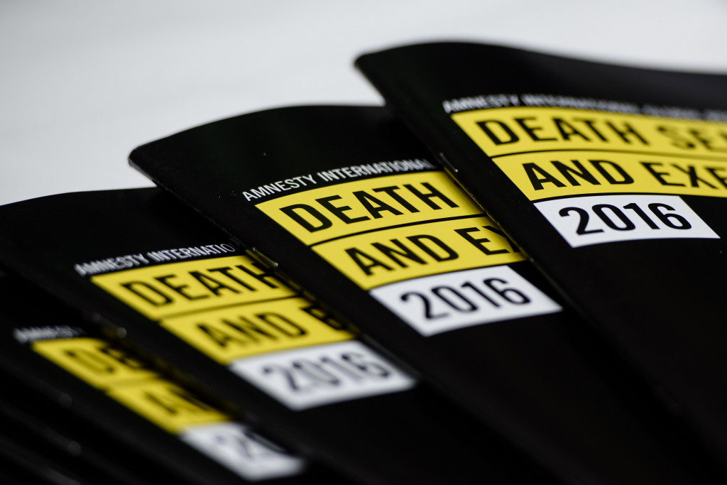 In this photo taken on April 10, 2017, global report booklets by Amnesty International entitled 'Death Sentence and Execution' are displayed on a table during a media briefing by Amnesty International at the Foreign Correspondents' Club (FCC) in Hong Kon