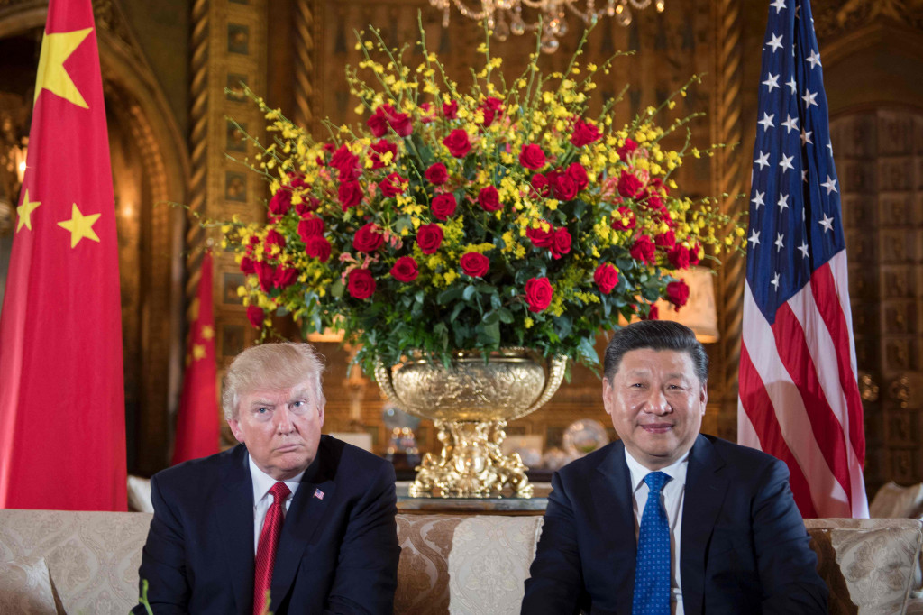 US President Donald Trump (left) sits with Chinese President Xi Jinping (right) during a bilateral meeting at the Mar-a-Lago estate in West Palm Beach, Florida, on April 6, 2017. (Photo:AFP/Jim Watson)