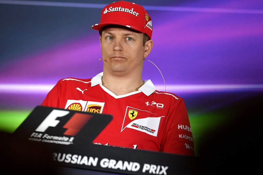 Pembalap Ferrari, Kimi Raikkonen. (AFP PHOTO / ANDREJ ISAKOVIC)