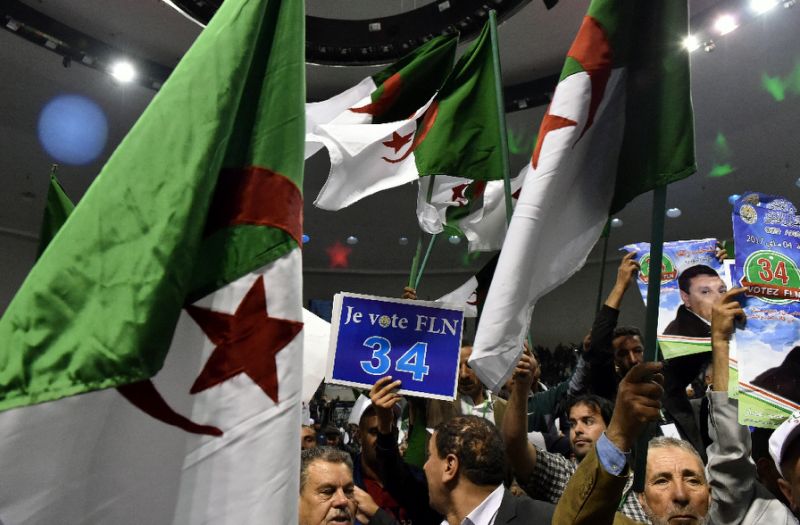 Members of Algeria's National Liberation Front (FLN) gather at a party conference in Algiers on April 28, 2017, while campaigning for May 4 elections. Media reports suggest however that Algerians are more interested in the French presidential election. (