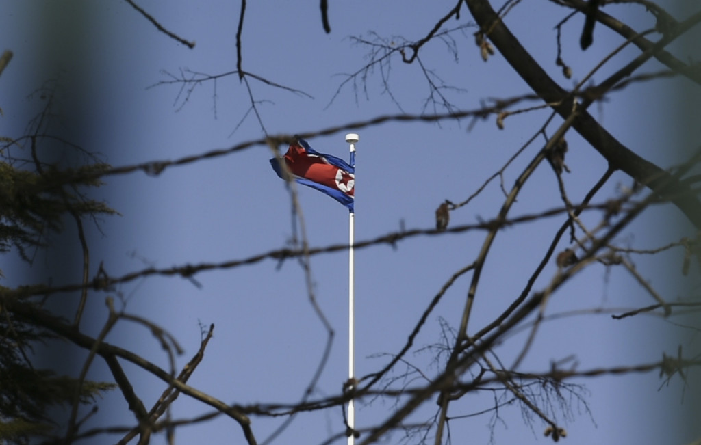 This file photo taken on March 8, 2017 shows  The North Korean national flag flying at the North Korean Embassy in Beijing. (Photo:AFP/Fred Dufour)