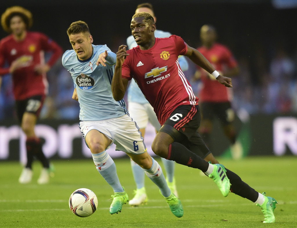 Paul Pogba (Kanan). (Foto: AFP/ Miguel Riopa)