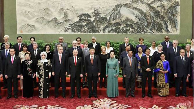 Chinese President Xi Jinping poses for a group photo with delegates and guests at a welcoming banquet for the Belt and Road Forum in Beijing. (AFP/Pool/Jason Lee)