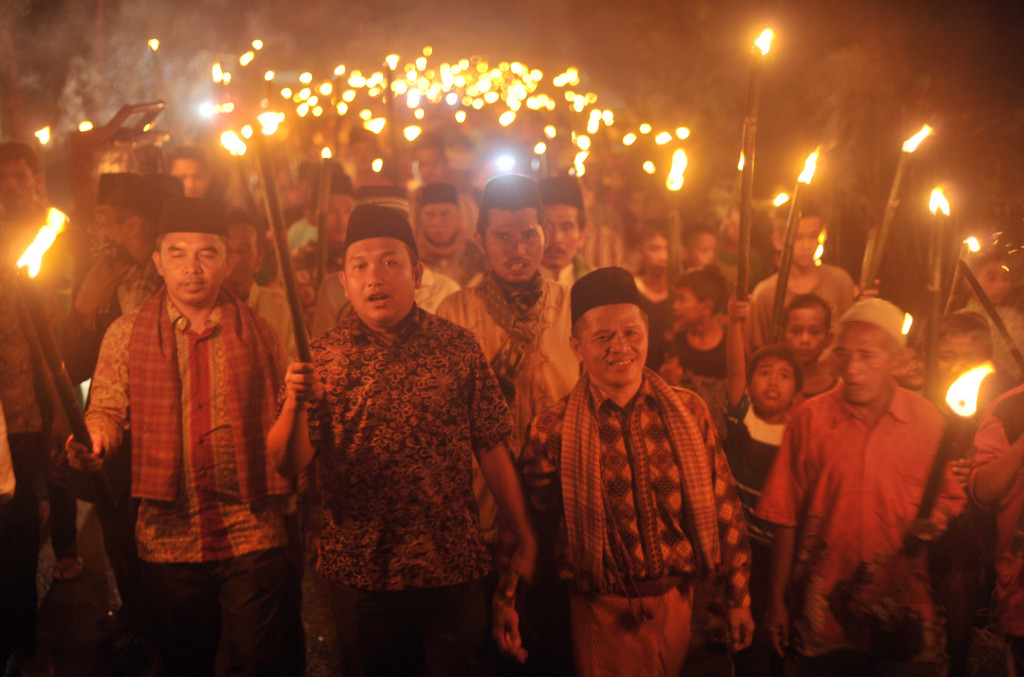 ILUSTRASI: Warga melakukan pawai obor menyambut Ramadan/ANTARA FOTO/Iggoy