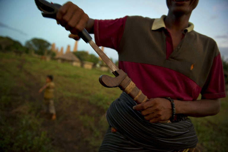 Many men on the Indonesian island of Sumba carry swords. (Photo:AFP/Romeo Gacad)