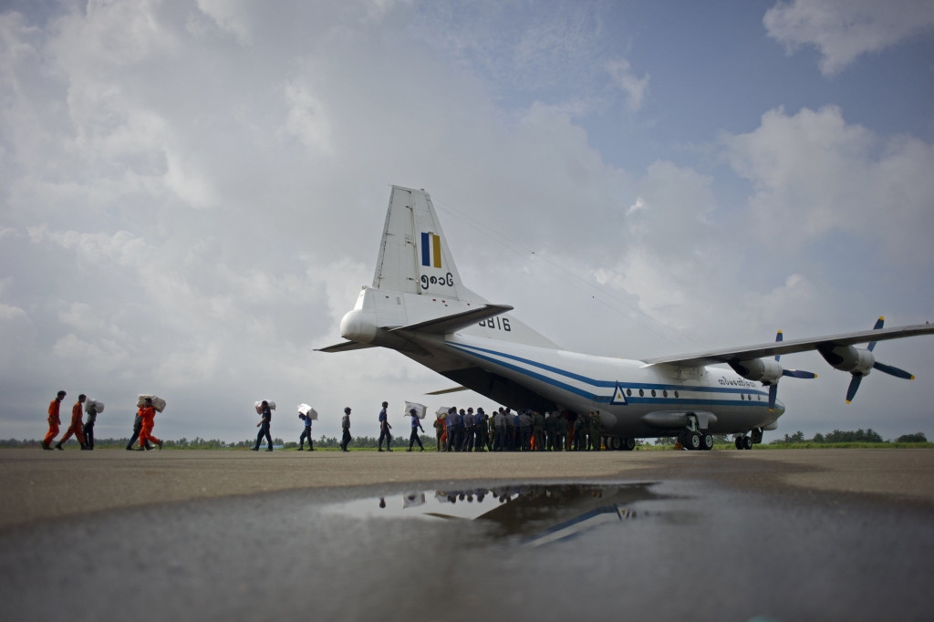 This file photo taken on August 5, 2015 shows a Myanmar Air Force Shaanxi Y-8 transport aircraft being unloaded at Sittwe airport in Rakhine state. (Photo:AFP/Ye Aung thu)