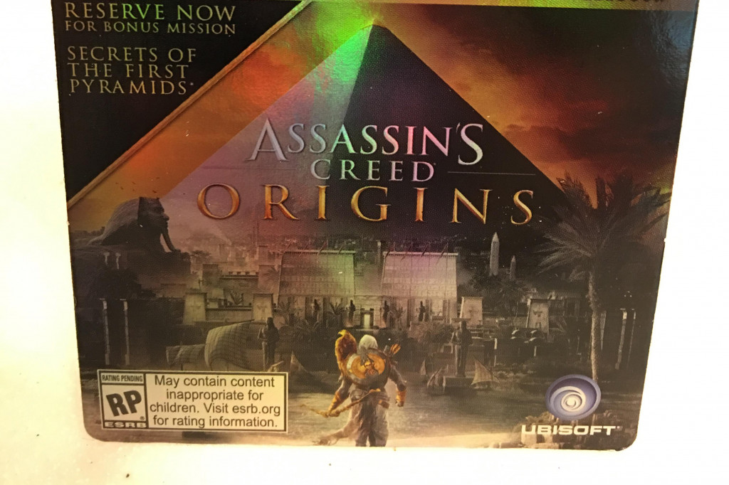 Foto kartu pemesanan Assassins Creed Origins