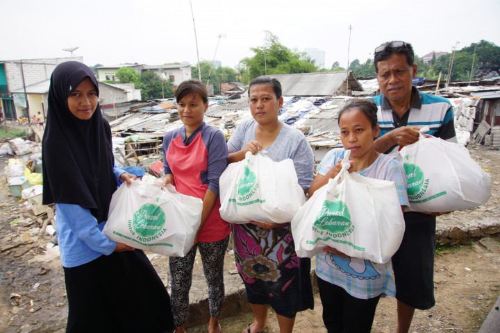 Senyum Kebahagiaan Pemulung