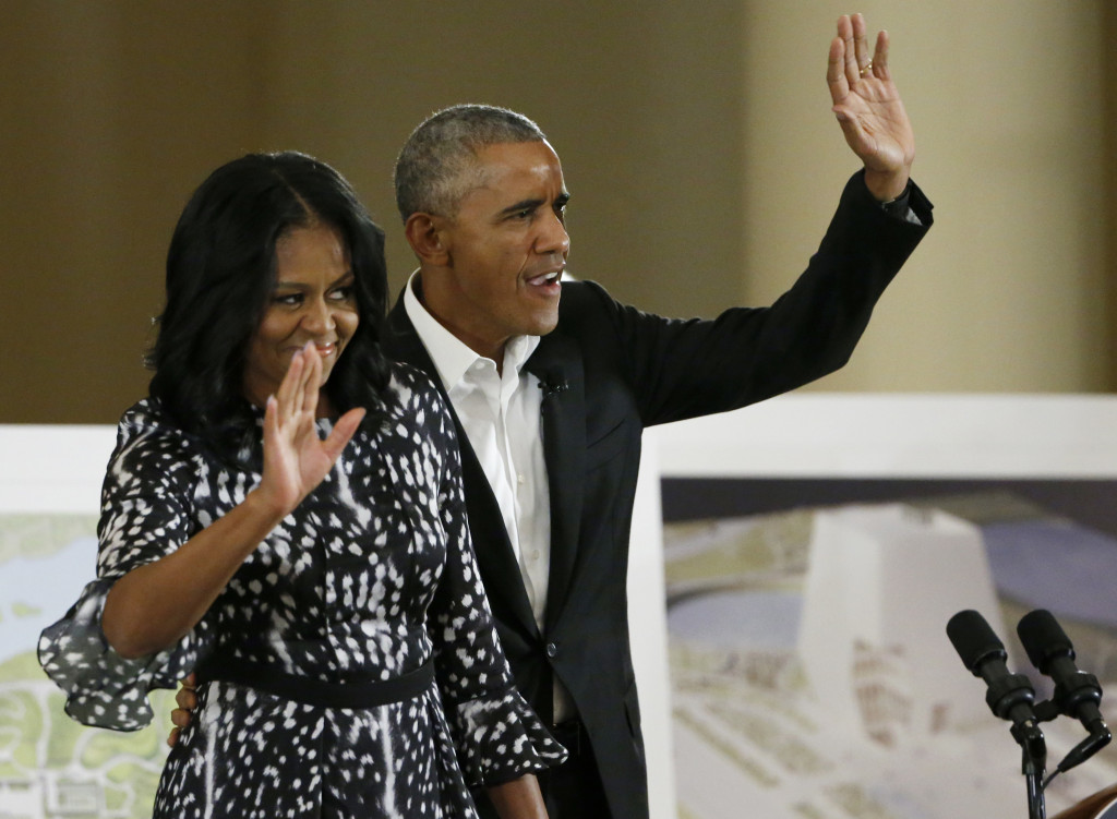 Mantan Presiden ke-44 AS, Barack Obama dan istrinya, Michelle Obama. (Foto: AFP)