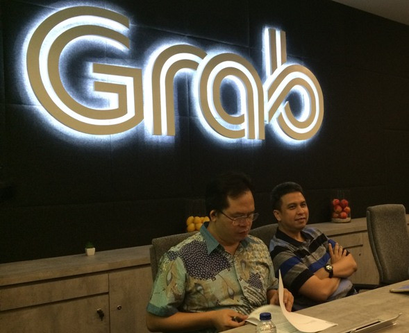 Grab Persilakan <i>Driver</i> Penolak Kode Etik Mundur