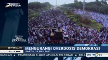 Mengurangi Overdosis Demokrasi