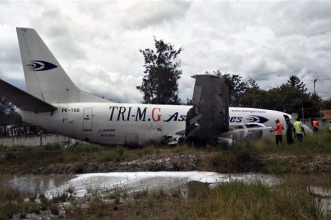 Cargo Plane Sildes Off Runway in Wamena