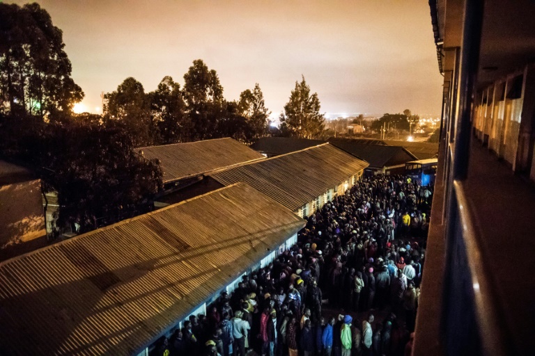 Voters queue as they wait for a polling station to open in Kibera in Nairobi on August 8 (Photo:AFP/Marco Longari)