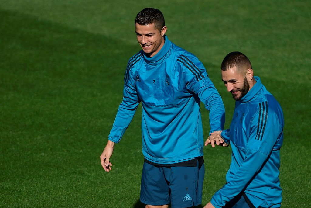 Cristiano Ronaldo dan Karim Benzema. (Foto: AFP/Pierre-Philippe Marcou)