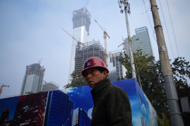China's economy is looking to transition away from investment heavy growth to consumer-led expansion. (Photo:AFP/Wang Zhao)