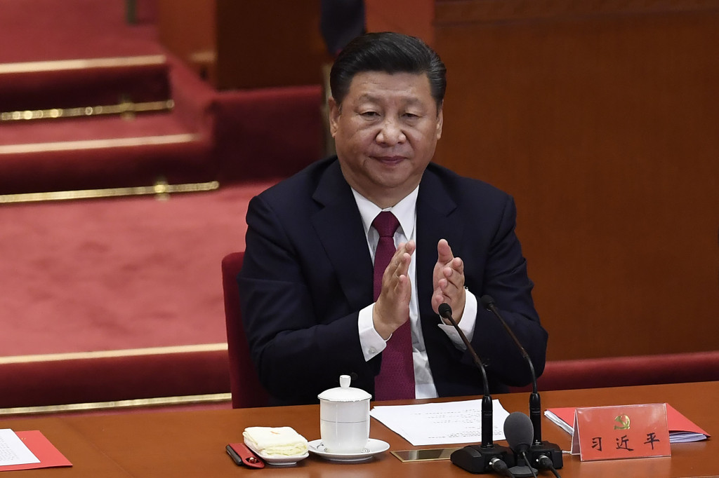 Chinese President Xi Jinping applauds during the closing of the 19th Communist Party Congress at the Great Hall of the People in Beijing on October 24, 2017. (Photo:AFP/Wang Zhao)