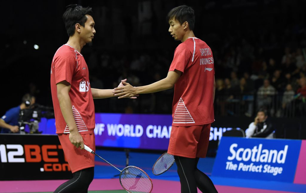 Mohammad Ahsan/Rian Agung Saputro. (AFP PHOTO / ANDY BUCHANAN)