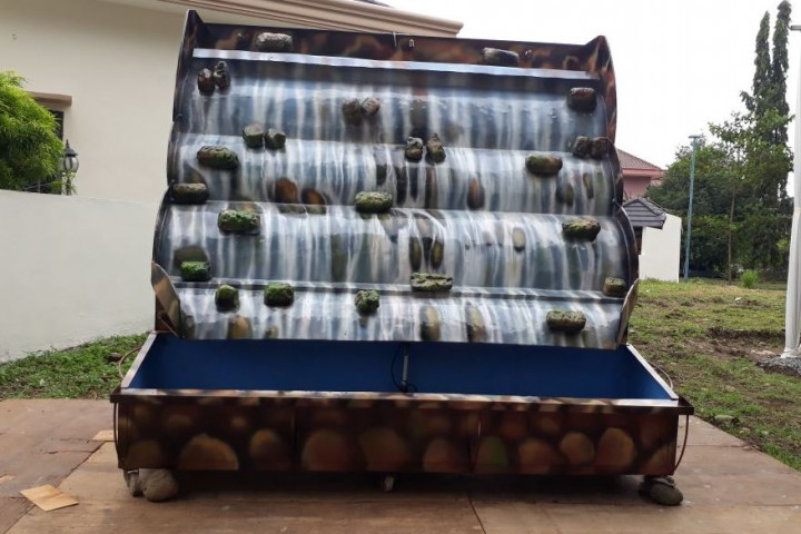 Kahiyang akan <i>Marpangir</i> di Air Terjun Buatan