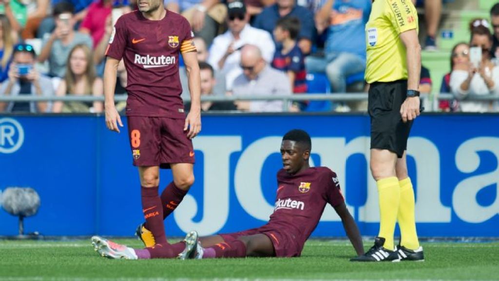 Ousmane Dembele saat mendapat cedera (Foto: espn)