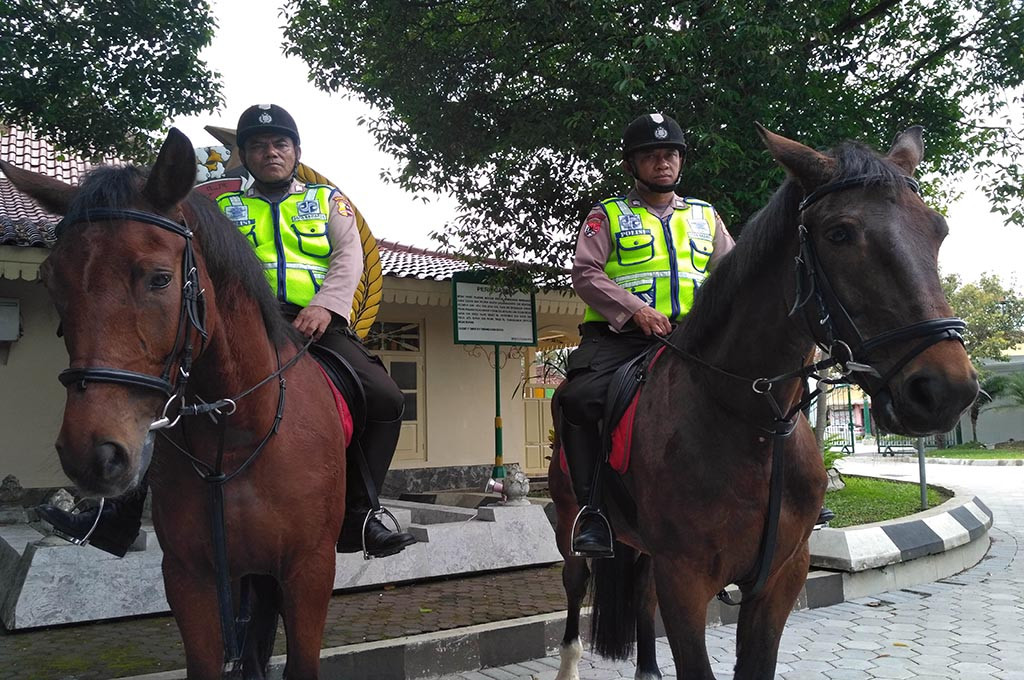 G dan Sandoka berpatroli bersama polisi di sekitar kawasan Maliobro, Yogyakarta -- medcom.id/Patricia Vicka
