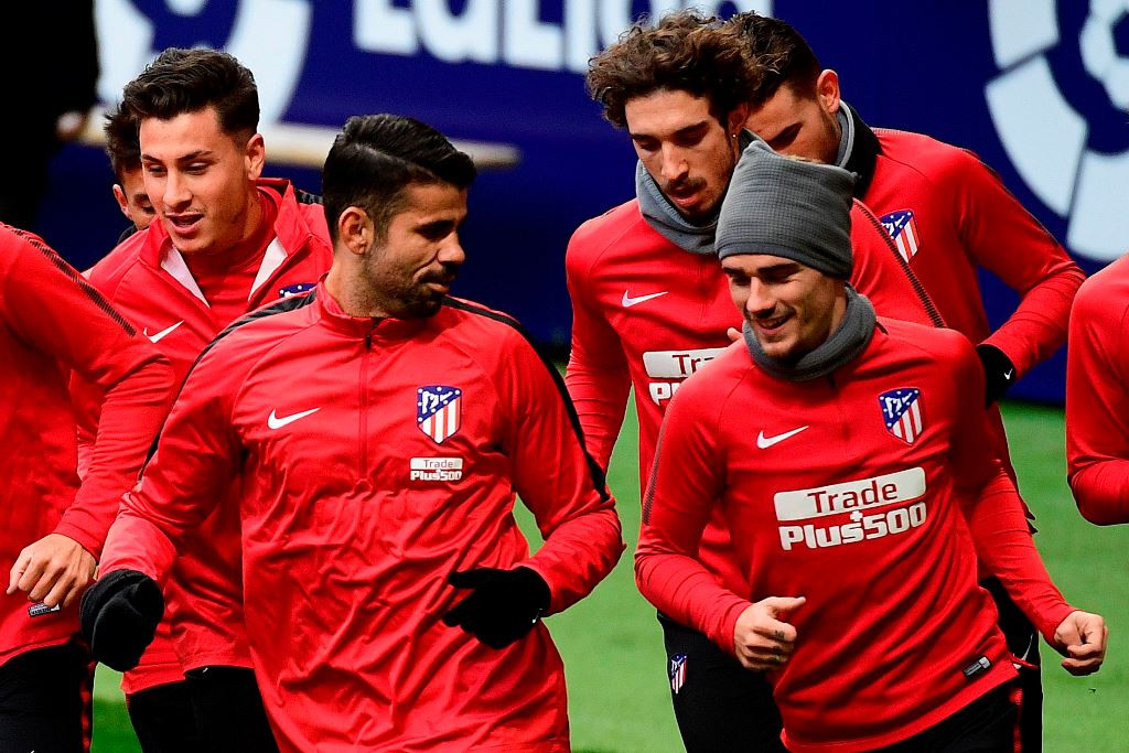 Diego Costa dan rekan-rekannya di Atletico Madrid sudah jalani latihan bersama. (Foto: AFP PHOTO / PIERRE-PHILIPPE MARCOU)