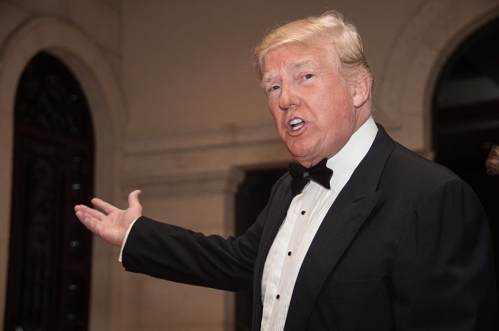 Presiden AS Donald Trump dalam pesta perayaan malam pergantian tahun di Mar-a-Lago, Florida, AS, 31 Desember 2017. (Foto: AFP/NICHOLAS KAMM)