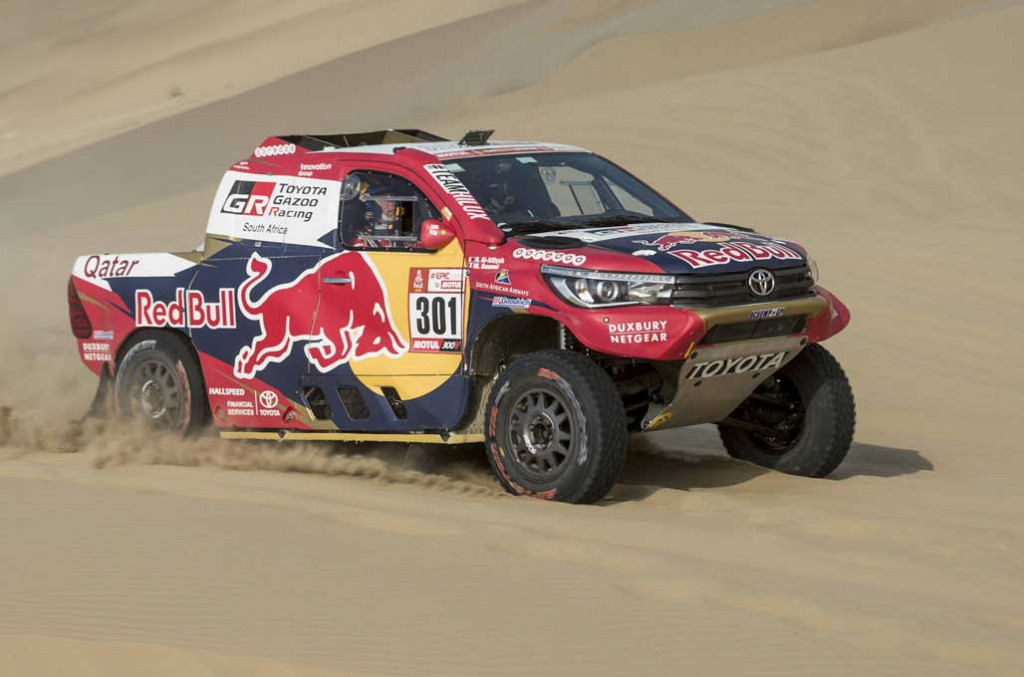 Nasser Al-Attiyah tetap tampil kompetitif, meski pakai Toyota. Red Bull 