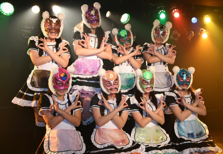 Singing the praises of bitcoin: the Virtual Currency Girls. (Photo:AFP/Kazuhiro Nogi)