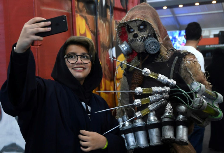 A Saudi woman takes a 