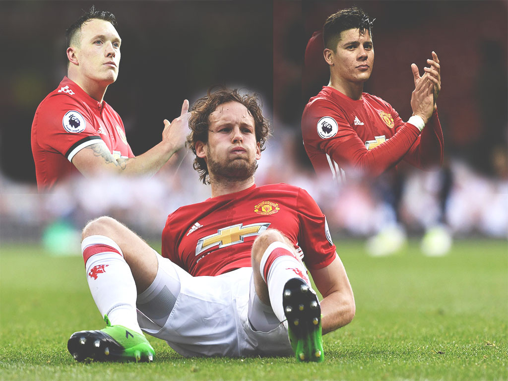 Phil Jones, Daley Blind dan Marcos Rojo. (Foto: AFP) 