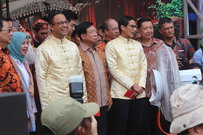 Gubernur dan Wakil Gubernur DKI Jakarta Anies Baswedan - Sandiaga Uno saat menghadiri perayaan Cap Go Meh. Medcom.id/ Kautsar W