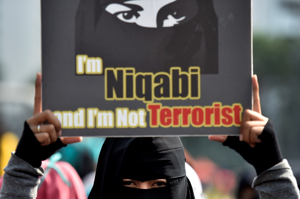 ILUSTRASI: Komunitas Niqab Squad melakukan aksi damai di Bundaran Hotel Indonesia, Jakarta, Minggu (10/9)/ANTARA/Puspa Perwitasari.