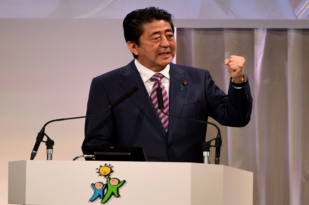 PM Jepang Shinzo Abe dalam konvensi LDP di Tokyo, 25 Maret 2018. (Foto: AFP/TOSHIFUMI KITAMURA)
