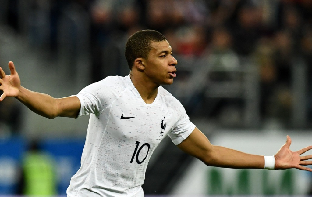Momen saat Kylian Mbappe melakukan selebrasi usai membobol gawang Rusia (Foto: AFP/Franck Fife)