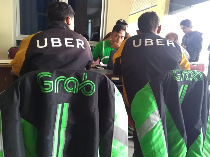 KPPU Awasi Grab Pascaakuisisi Uber
