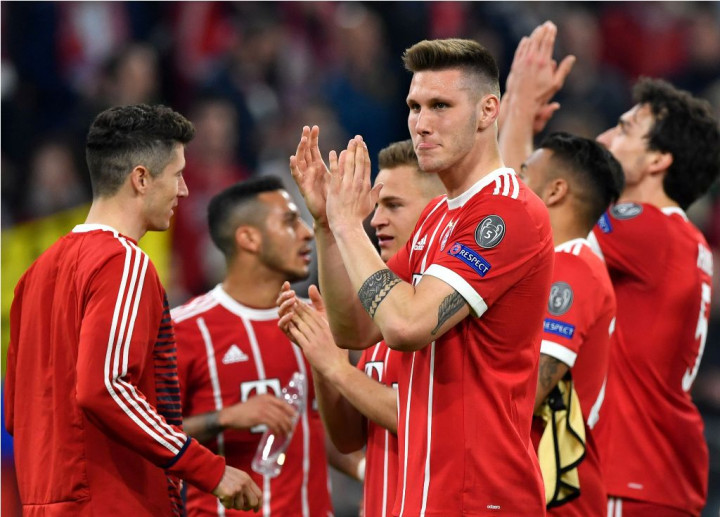 Tahan Sevilla, Muenchen Tatap Semifinal