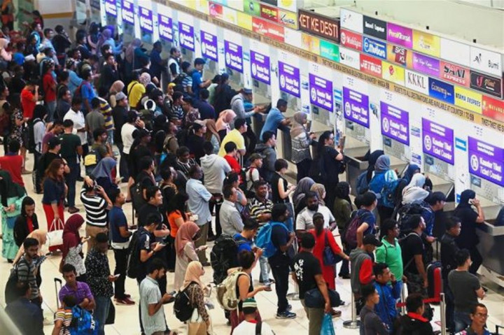 Ratusan Ribu Warga Malaysia Pulang Kampung untuk Memilih