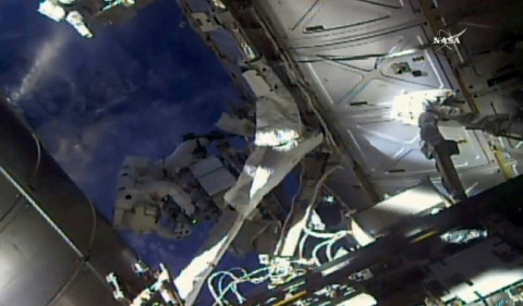 Veteran spacewalkers Ricky Arnold and Drew Feustel are checking