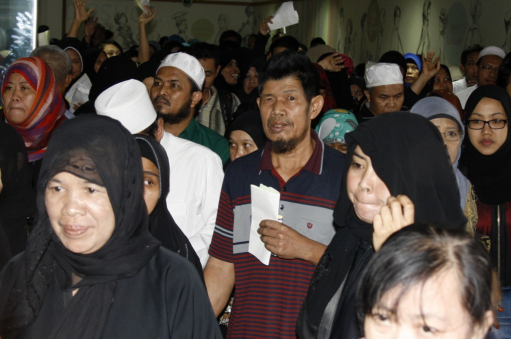 Sejumlah TKI yang dipulangkan pemerintah Indonesia dari Arab Saudi tiba di terminal TKI Bandara Soekarno-Hatta,Tangerang, Banten, Rabu 11 November 2015. (Foto: Antar/Lucky R)