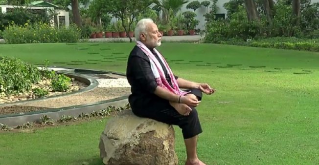 Bend It Like Modi: Indian PM Trots and Treads in Fitness Video