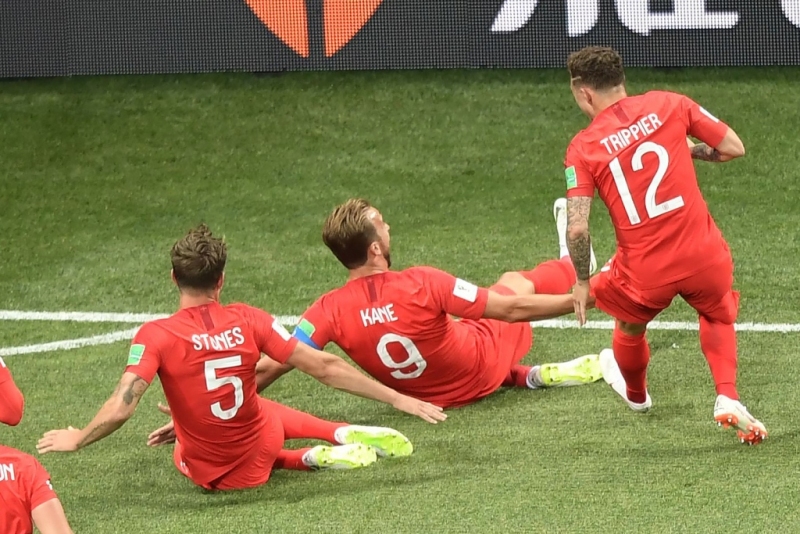 Harry Kane (no. punggung 9) menjadi top skor sementara Piala Dunia 2018. (Foto: AFP PHOTO / NICOLAS ASFOURI)