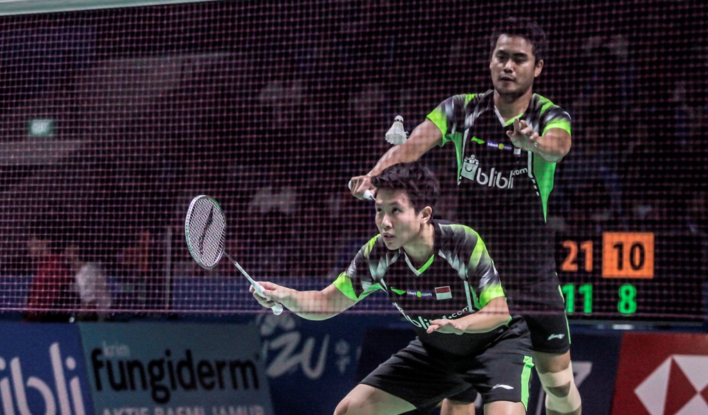 Aksi Tontowi Ahmad-Liliyana Natsir saat tampil di laga pembuka Indonesia Open 2018 (Foto: ANTARA FOTO/Muhammad Adimaja)