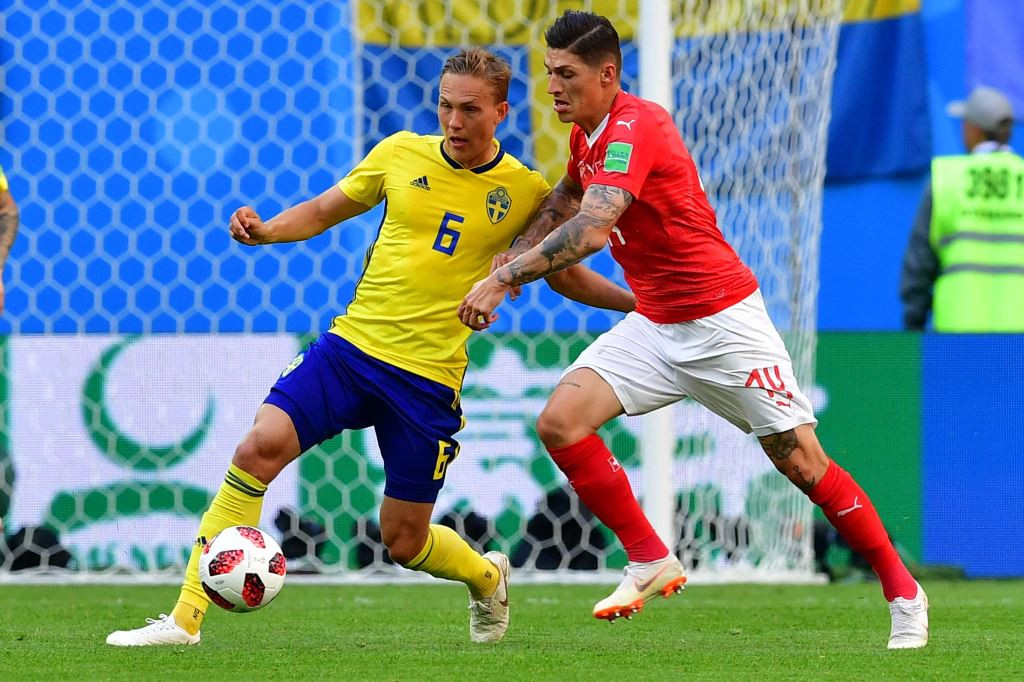 Suasana laga Swedia vs Swiss. (AFP PHOTO / Giuseppe CACACE)