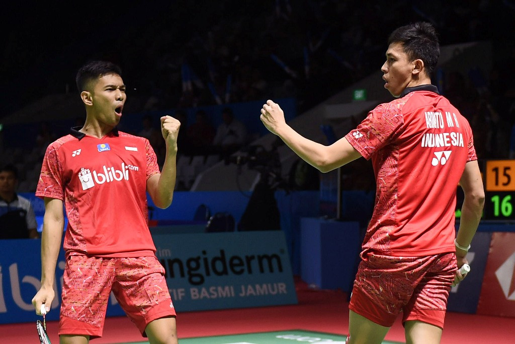 Selebrasi Fajar-Rian usai meraih poin atas pasangan Tiongkok Liu Cheng-Zhang Nan (Foto: ANTARA FOTO/Akbar Nugroho Gumay)