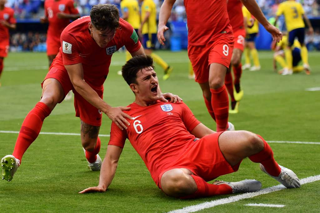 Harry Maguire selepas mencetak gol. (Foto: AFP/FABRICE COFFRINI)