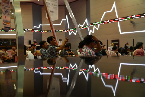 Ilustrasi kegiatan di pasar modal. (FOTO: ANTARA/Sigid Kurniawan)