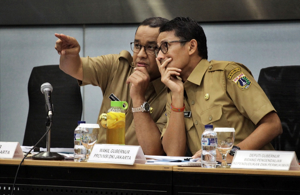 Gubernur DKI Jakarta Anies Baswedan dan Wakil Gubernur DKI Jakarta Sandiaga Uno. ANT/Arizona Sudiro.